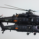 Helicópteros Z-20 vuelan durante la 5ta Exposición de Helicópteros de China, en la Zona de Libre Comercio del Puerto de Tianjin el 10 de octubre de 2019 en Tianjin, China